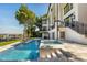 Luxury pool and spa with spacious patio and lake view at 9832 Laurel Valley Dr, Windermere, FL 34786