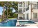 Resort-style pool with a spa and ample lounge space at 9832 Laurel Valley Dr, Windermere, FL 34786
