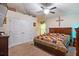Spacious main bedroom with large bed and walk-in closet at 31 Diamond Ridge Way, Ocala, FL 34472