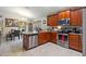 Modern kitchen with stainless steel appliances and ample cabinetry at 31 Diamond Ridge Way, Ocala, FL 34472