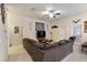 Spacious living room featuring a large sectional sofa at 31 Diamond Ridge Way, Ocala, FL 34472