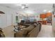 Open concept living area with kitchen access and vaulted ceilings at 31 Diamond Ridge Way, Ocala, FL 34472