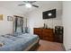 Comfortable bedroom with ample closet space and TV at 31 Diamond Ridge Way, Ocala, FL 34472