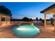 Inviting pool with lake view, surrounded by a spacious patio at 16716 Artimino Loop, Montverde, FL 34756