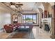 Spacious living room with fireplace and stunning water views at 16716 Artimino Loop, Montverde, FL 34756