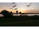 Peaceful sunset view over the lake at 16716 Artimino Loop, Montverde, FL 34756