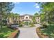 Luxury home with a fountain and circular driveway at 16716 Artimino Loop, Montverde, FL 34756