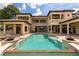 Luxury home with inviting pool and expansive patio at 16716 Artimino Loop, Montverde, FL 34756