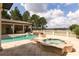 Resort-style pool and spa with lake views at 16716 Artimino Loop, Montverde, FL 34756