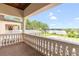 Covered balcony offering stunning lake views at 16716 Artimino Loop, Montverde, FL 34756