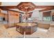 Open kitchen with large island and high-end finishes at 16716 Artimino Loop, Montverde, FL 34756