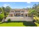 Luxury home with large pool and lush lawn at 16716 Artimino Loop, Montverde, FL 34756
