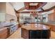 Gourmet kitchen boasts large island, custom cabinetry, and high-end appliances at 16716 Artimino Loop, Montverde, FL 34756