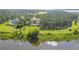 Luxury home nestled in a wooded waterfront setting at 16716 Artimino Loop, Montverde, FL 34756