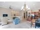 Open living space with kitchen and dining area at 16716 Artimino Loop, Montverde, FL 34756