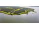 Exceptional waterfront property with lush surroundings at 16716 Artimino Loop, Montverde, FL 34756