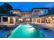 Expansive backyard with a large pool and fire features at 16716 Artimino Loop, Montverde, FL 34756