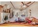 Elegant living room with a fireplace and views to dining area at 16716 Artimino Loop, Montverde, FL 34756