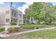 Modern building exterior showcasing a clean design and serene landscaping at 700 Melrose Ave # E4, Winter Park, FL 32789