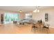 Living Room with staged furniture and access to patio at 700 Melrose Ave # E4, Winter Park, FL 32789