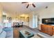 Open living space with dining area and access to bathroom at 8125 Resort Village Dr # 5405, Orlando, FL 32821