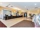 Hotel-style lobby with reception desk and seating area at 8125 Resort Village Dr # 5405, Orlando, FL 32821