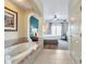 Bathroom with a large bathtub and access to bedroom at 8125 Resort Village Dr # 5405, Orlando, FL 32821