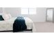 Serene bedroom with king-size bed and green throw blanket at 7904 Waterfield Ave # 1, Orlando, FL 32832