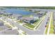 Aerial view of a house in a quiet community by a lake at 7904 Waterfield Ave # 1, Orlando, FL 32832