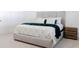 Spacious bedroom with a comfortable bed and nightstand at 7904 Waterfield Ave # 1, Orlando, FL 32832