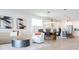 Open floor plan with modern kitchen, dining table, and living room area at 7904 Waterfield Ave # 1, Orlando, FL 32832
