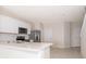 Modern kitchen with stainless steel appliances and island at 2742 Fetching Trl, Davenport, FL 33896