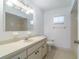 Bathroom with single sink vanity and shower/tub combo at 17775 Se 101St Ct, Summerfield, FL 34491