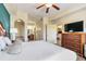 King bedroom suite with en-suite bathroom and walk-in closet at 8125 Resort Village Dr # 5509, Orlando, FL 32821
