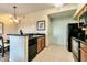 Modern kitchen featuring black appliances and granite countertops at 8125 Resort Village Dr # 5509, Orlando, FL 32821