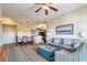 Open concept dining area with a table for four and kitchen access at 8125 Resort Village Dr # 5509, Orlando, FL 32821