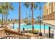 Resort-style pool with pirate ship and surrounding lounge chairs at 8125 Resort Village Dr # 5509, Orlando, FL 32821