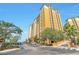 Resort style building with ample parking and lush landscaping at 8125 Resort Village Dr # 5509, Orlando, FL 32821