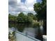 Calm water view with lush green trees and vegetation at 24650 Fox Rd, Astor, FL 32102
