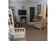 Living room with comfortable seating and TV at 24650 Fox Rd, Astor, FL 32102