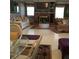 Spacious living room featuring a fireplace and ample seating at 24650 Fox Rd, Astor, FL 32102