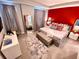 Spacious Primary bedroom with large bed and accent wall at 2178 Cooper Bell Pl, Kissimmee, FL 34747