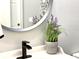 Stylish bathroom with black matte faucet and decor at 2178 Cooper Bell Pl, Kissimmee, FL 34747
