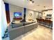 Open concept living room and kitchen with modern finishes at 2178 Cooper Bell Pl, Kissimmee, FL 34747
