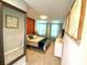Bedroom with full bed and wood accent wall at 2178 Cooper Bell Pl, Kissimmee, FL 34747