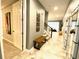 Spacious entryway with tile floors and modern mirrors at 2178 Cooper Bell Pl, Kissimmee, FL 34747