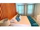 Bedroom with full bed and wood accent wall at 2178 Cooper Bell Pl, Kissimmee, FL 34747