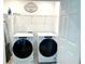Laundry room with side-by-side washer and dryer at 2178 Cooper Bell Pl, Kissimmee, FL 34747