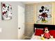 Minnie Mouse themed bedroom with a twin bed and red accents at 2178 Cooper Bell Pl, Kissimmee, FL 34747