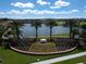 Solara Resort entrance sign with lake view in background at 2178 Cooper Bell Pl, Kissimmee, FL 34747
